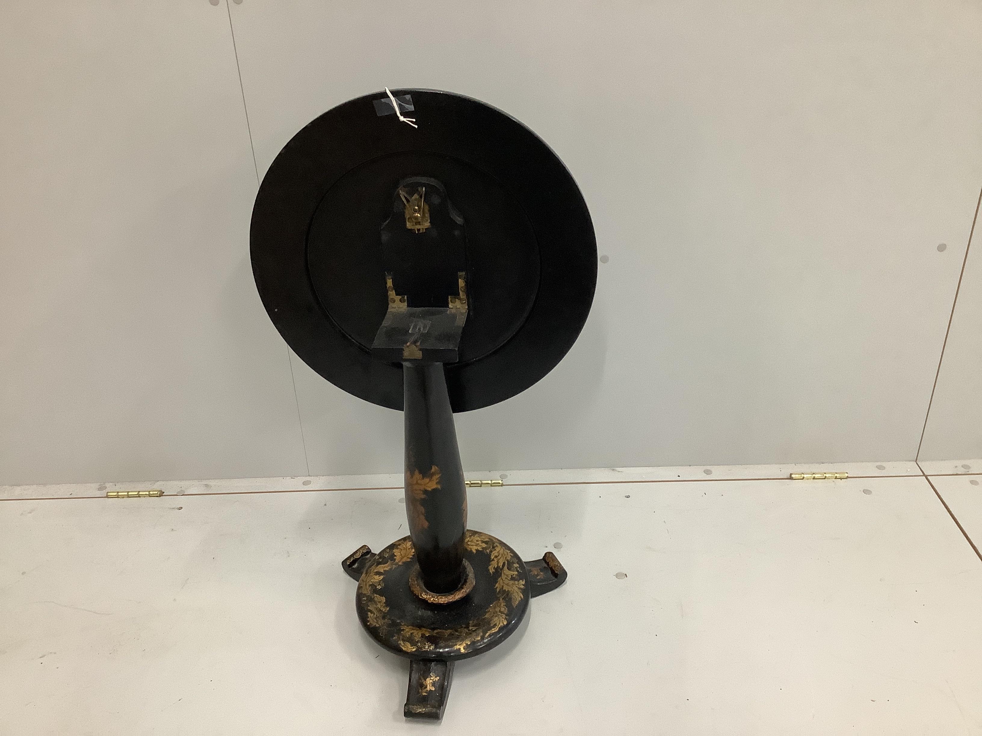 A Victorian black lacquered papier mache occasional table, with circular tile top, chinoiserie decoration and mother of pearl inlay, on single column, diameter 48cm, height 57cm